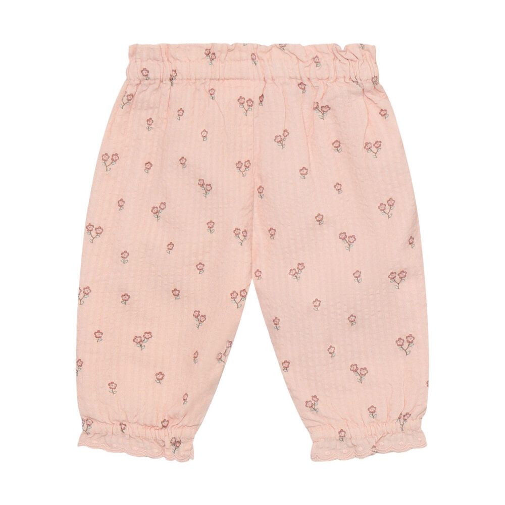 Spodnie bawełniane w kwiatuszki – pudrowy róż, falbanka